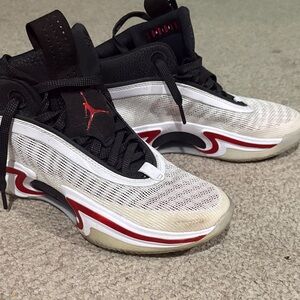 Black and White RETRO Jordan Sneakers with Red Accents
